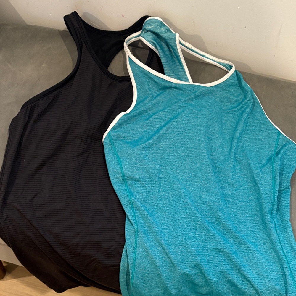 Lululemon set of 2 Women's Black and Teal Tank Tops. Size 6
